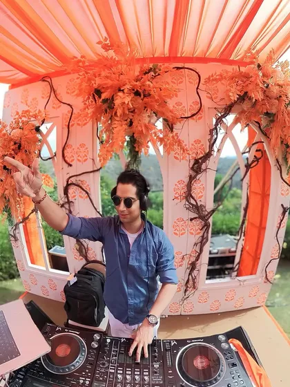 Crafting the perfect vibe for a sun-drenched sundowner party. My goal is to match the music to the beautiful setting, creating a relaxed yet celebratory atmosphere for everyone.