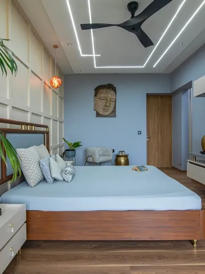 Another angle showcasing the thoughtful layout, with a cozy armchair for reading and a clear view of the integrated TV and desk area.