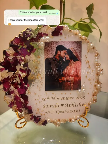 "Thank you for the beautiful work." A simple message of gratitude from a happy client, shown with their custom resin plate featuring preserved petals and their wedding photo.