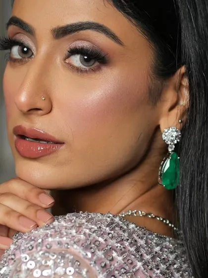The glowing highlight on her cheekbones gives her skin a radiant, healthy look. This is a key part of my signature soft glam style.