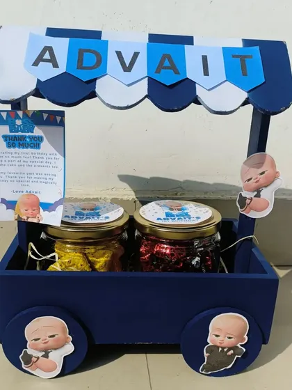 Another angle of the 'Boss Baby' themed gift cart. The personalization with the name 'Advait' on the canopy makes it a truly special and individual gift.