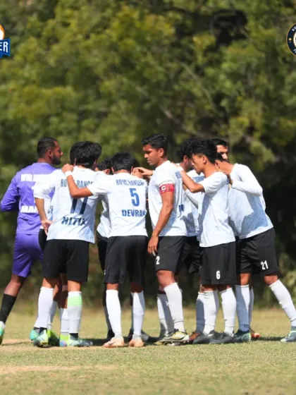 A team huddle before the match. This is where we unite, motivate each other, and focus on the game plan. Together, we are stronger.