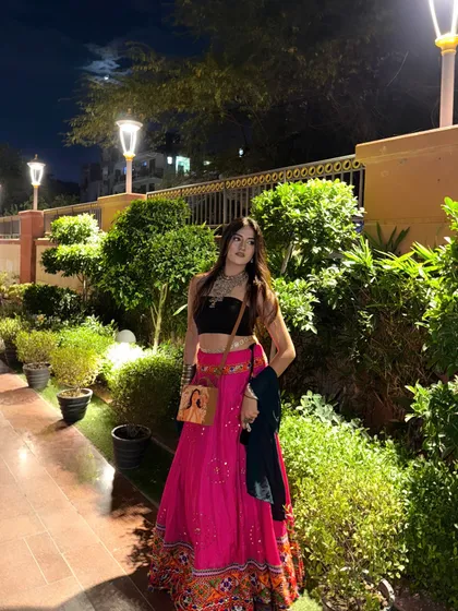 My Dandiya night look. A vibrant pink lehenga skirt from Janpath paired with a black tube top and lots of oxidized jewelry.
