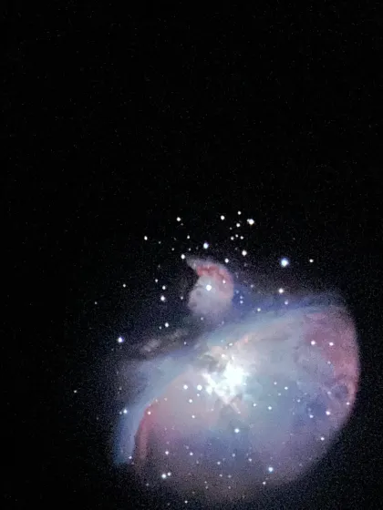 A breathtaking view of the Orion Nebula, captured through our telescope. This is what you can witness firsthand, a celestial wonder far from the city's glow.