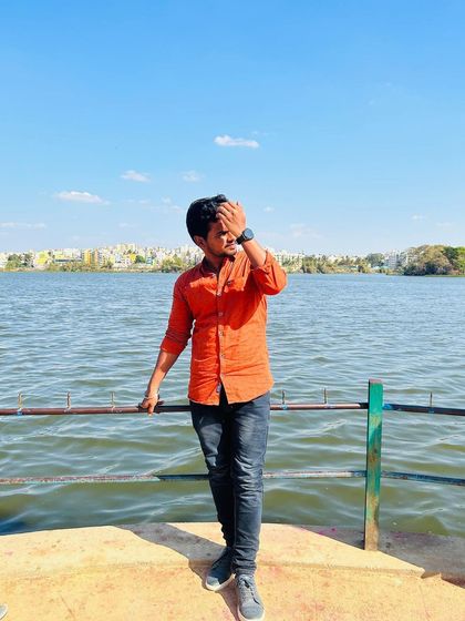 A candid moment enjoying the breeze at the lake.