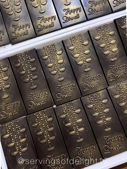 A closer look at the "Happy Diwali" chocolate bars. I use special molds and add a touch of edible gold dust to make them shine.