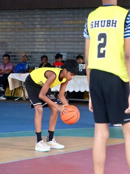A young player sets up for a play during a sub-junior tournament. Even at a young age, we focus on teaching game awareness and positioning.