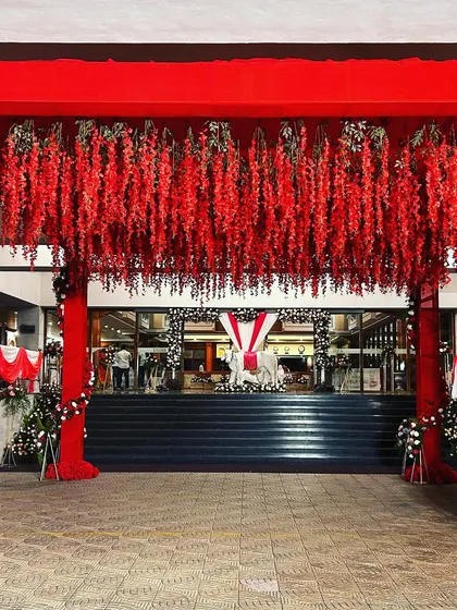 The grand scale of the entrance decor, setting the stage for a massive celebration.