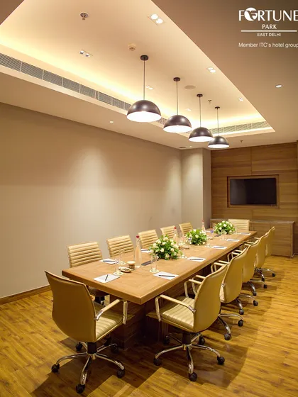This is another view of my fully-equipped boardroom, showcasing its ample space and modern amenities. It is the perfect venue for hosting everything from board meetings to intensive training sessions.