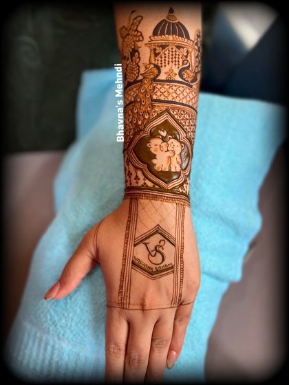 The design in progress, showing the placement of the couple figures and the initial block.