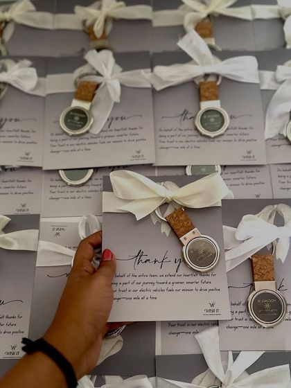 A sea of "thank you" notes, each attached to a custom-branded keychain. It's a small token, but it carries a powerful message of appreciation for our client in the UAE.