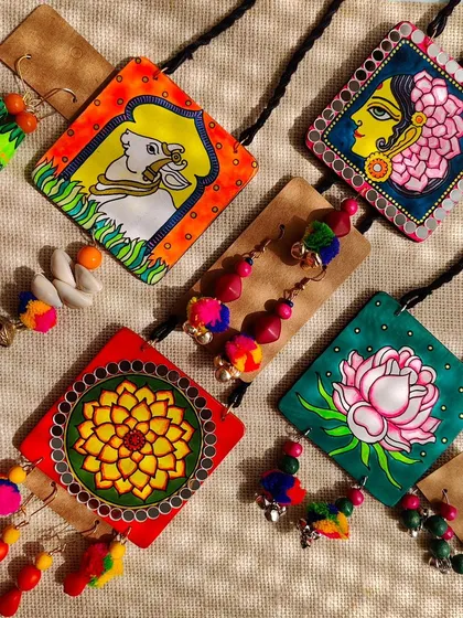 Here is a look at the variety of stories I love to tell through my art. This collection features four different hand-painted necklace sets, from the sacred Pichwai cow to the serene lotus flower, each with its own unique character and handcrafted details.