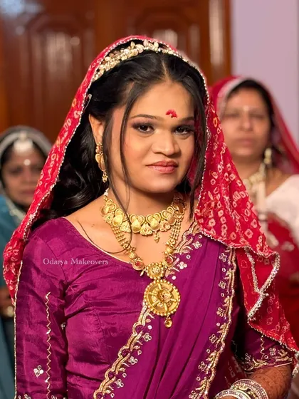 A close-up of the traditional Marwadi look for the wedding rituals, complete with a red bandhani dupatta.