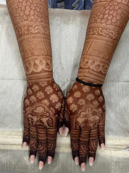 The beautiful dark stain of a lotus-themed design, showing how the delicate patterns hold their color.