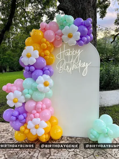 Another shot of the pastel daisy balloon garland, showing its vibrant colors in an outdoor setting.