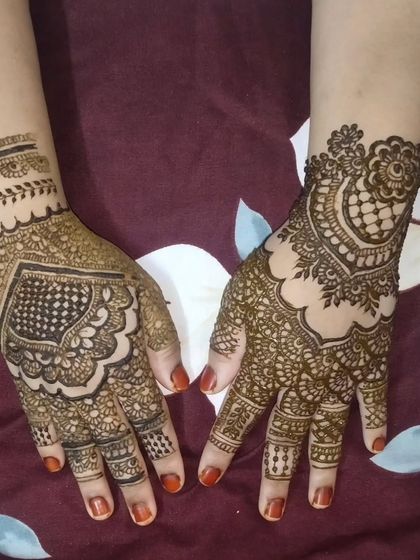 A classic Pakistani design with a large central medallion. The use of negative space around the motif makes it the star of the show.