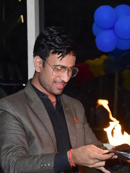 A shot from a private show, using fire to add a dramatic flair to my entrance. It always gets the party started.