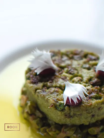A close-up of the delicate textures and edible flower garnish on our galouti. I believe that food should be a feast for the eyes as well as the palate.