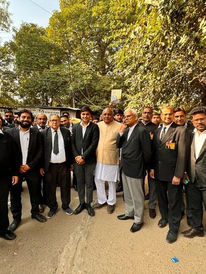 Standing with senior members of the bar during the campaign. Their guidance and experience are essential to our collective success.