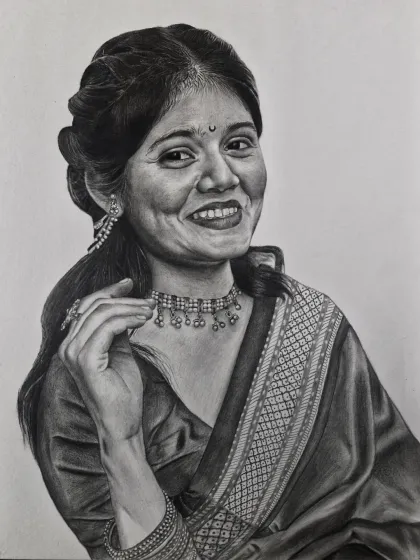 A beautiful example of a commissioned solo portrait. I use graphite and pencil to create soft tones and intricate details, from the pattern on the saree to the delicate jewelry, resulting in a timeless and personal piece of art.