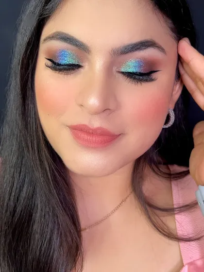 A full face of makeup featuring Charmacy Milano, with a focus on a duochrome eyeshadow.