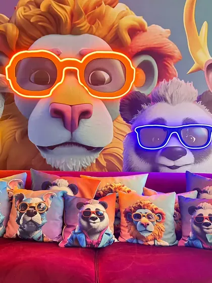 The custom-printed cushions featured cool, cartoon-style animals wearing sunglasses, adding a fun and modern touch to the sleepover theme.