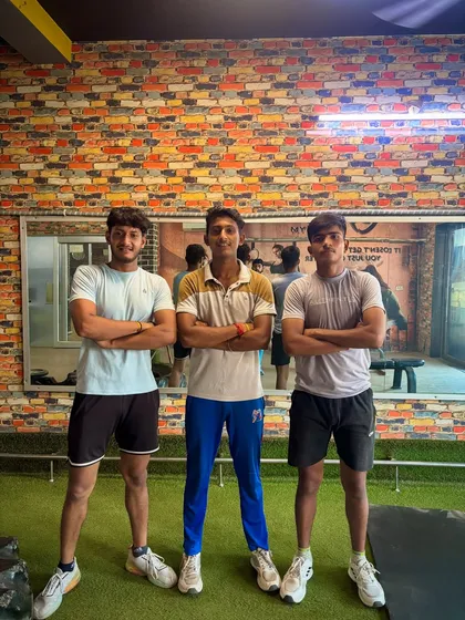 Three of our dedicated players after a tough gym session. Building strength is a core part of our training program.
