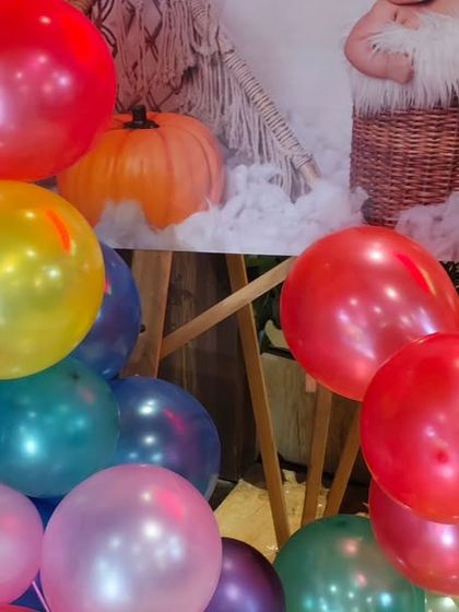 A close-up of the colorful balloons used in the princess-themed party, showing the vibrant primary colors that kids love.
