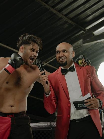 The post-fight interview. A moment of raw emotion after a hard-fought battle. Our fighter, Tarun, lets out a victory roar.