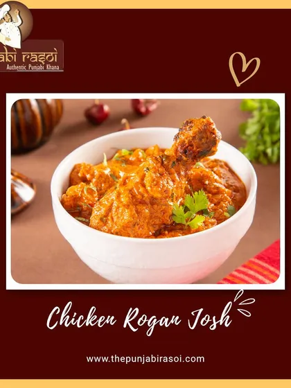 A close-up of our Chicken Rogan Josh, a rich and aromatic curry with tender chicken pieces. It's a classic dish that's full of warmth and spice.