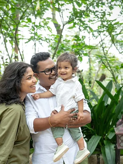 Your family's story isn't just confined to a studio. This outdoor family photoshoot took place amidst a beautiful green landscape in Bangalore, showing that we can capture your memories anywhere that is special to you.