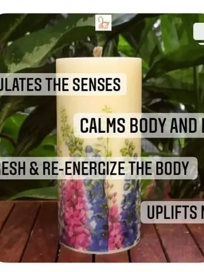 A beautiful floral pillar candle representing the uplifting and re-energizing benefits of certain fragrances. Our candles are designed to not only smell good but also make you feel good.