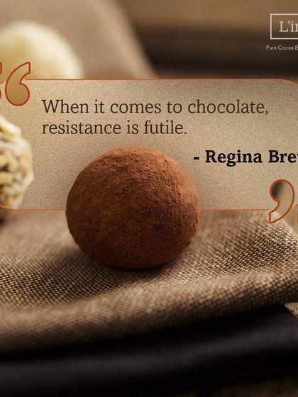 As Regina Bret said, 'When it comes to chocolate, resistance is futile.' This image pairs the wise words with our irresistible cocoa-dusted and almond-coated truffles.