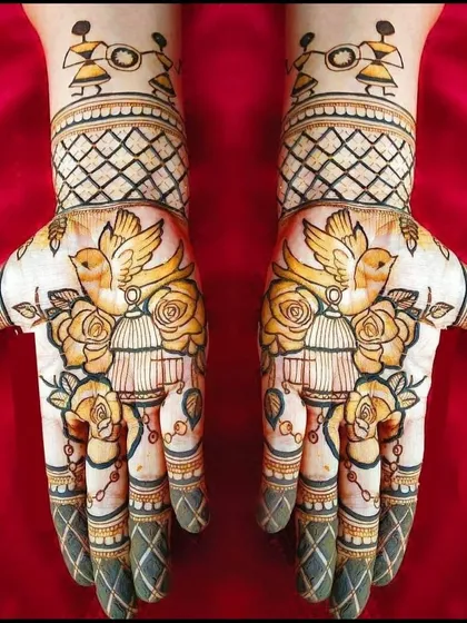 A whimsical design with birdcages, roses, and Warli art figures, showcasing our ability to blend different art styles into a cohesive piece.