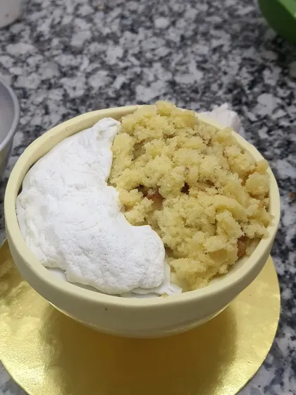 A behind-the-scenes look at the gym-themed cake. This is the cake bowl being filled with "keema crumble" and "rice" before the final decorations were added.