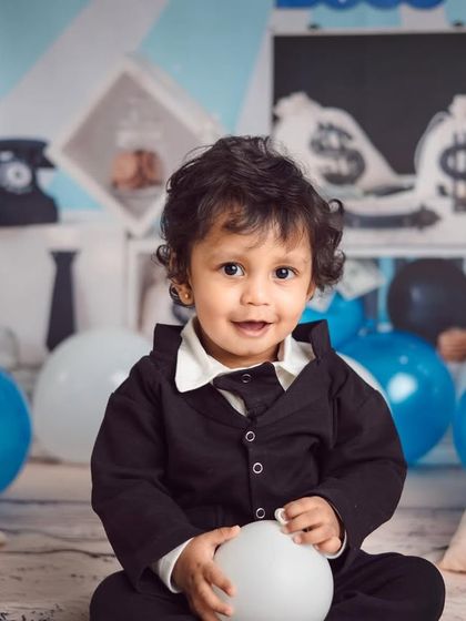 The Boss Baby is in the house. This theme is always a hit, featuring a tiny suit, money bags, and a retro office setup for your little executive.