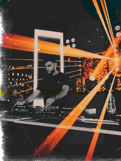 An edited, artistic photo that combines my performance with light flares, capturing the "magic" of an AV show.