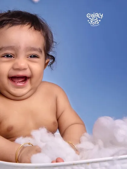 A happy baby's laugh is the most beautiful sound. My fun bathtub sessions are all about capturing those priceless, splashy giggles and expressions of pure delight.