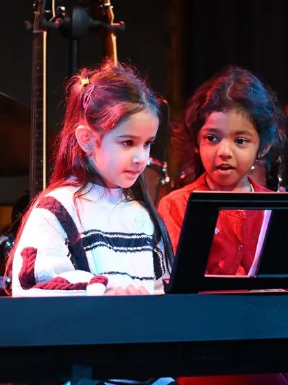 Our budding pianists performing together. Ensemble playing on keyboards teaches young students about rhythm, timing, and teamwork from an early age.