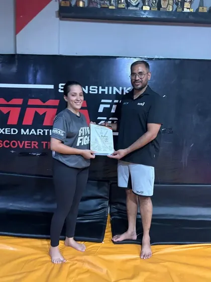 Recognizing a student's participation and effort during our training camp. We make sure to appreciate everyone who commits to growing with us.