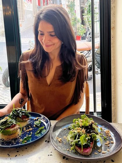 One happy, healthy, hungry vegan in Lisbon. Enjoying a beautiful and delicious plant-based brunch at a local cafe. Traveling as a vegan is an adventure in discovering amazing food.