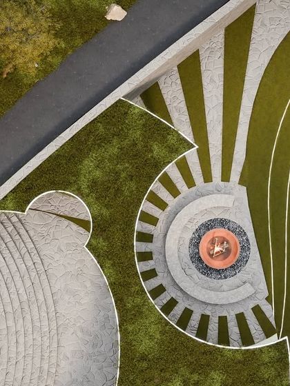 An aerial plan of the fire pit and amphitheater-style seating, showcasing the geometric and organic forms used in the landscape design.