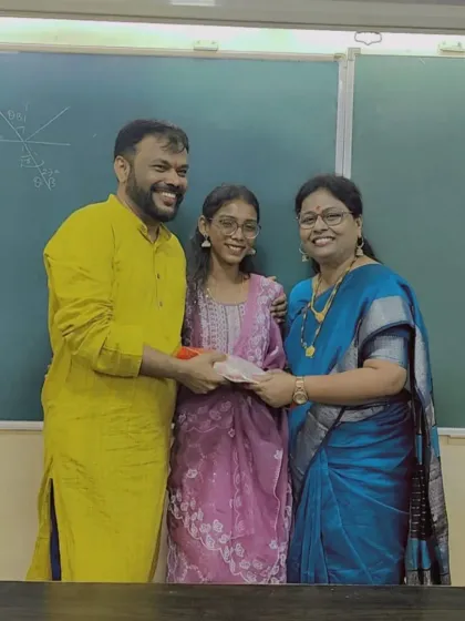 Smiles that shine brighter than diyas. A student receives a Diwali gift from our teachers, a small token of our appreciation and festive cheer.