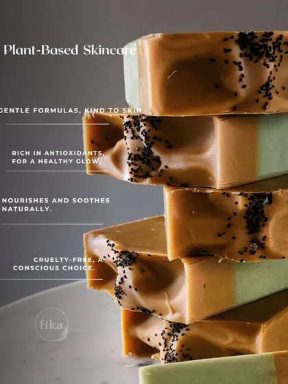 A simple cleanse, a beautiful difference. This stack of two-toned, poppy-seed-topped soaps demonstrates my gentle formulas. They are rich in antioxidants, cruelty-free, and designed to nourish and soothe naturally.