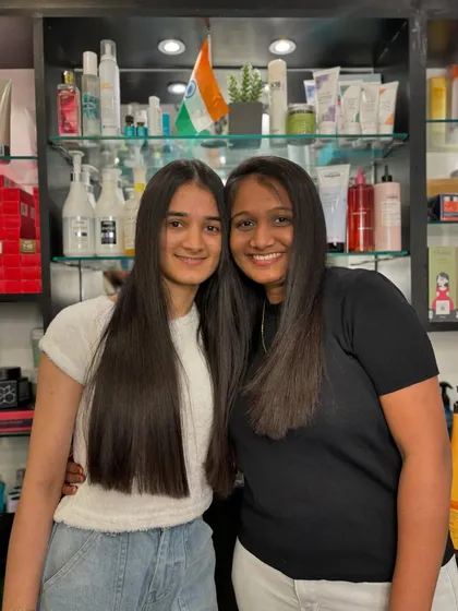 The goal of any smoothening treatment is silky, healthy-looking hair. This image showcases the beautiful, long-lasting results of a professional hair smoothening service, a foundational technique taught in my courses.