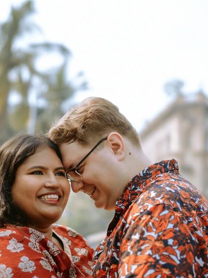 A close-up filled with laughter and happiness, showcasing the couple's vibrant connection during their Mumbai pre-wedding shoot.