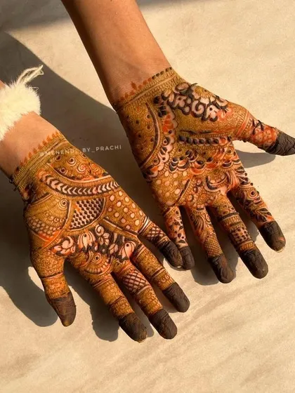 Another look at a beautiful, developing henna stain. The sunlight enhances the warm tones of the intricate design, showing the quality of the henna paste I use.
