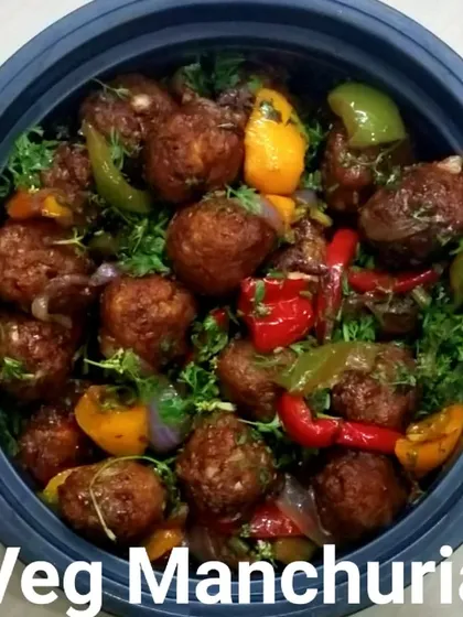 For those who enjoy Indo-Chinese flavors, I also make starters like this Veg Manchuria. These vegetable balls are tossed in a savory sauce with peppers and onions, making for a delicious appetizer.