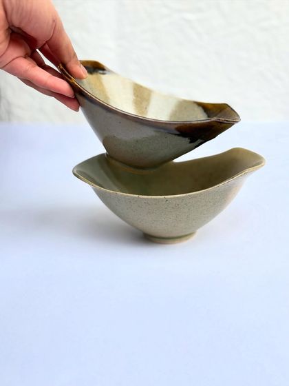 These snack bowls are designed to be stackable and stylish, perfect for serving nuts, olives, or dips.