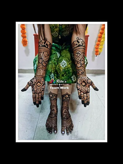 The complete look for the bride, with fully decorated hands and feet. This is a great example of my team's work for a full bridal package.